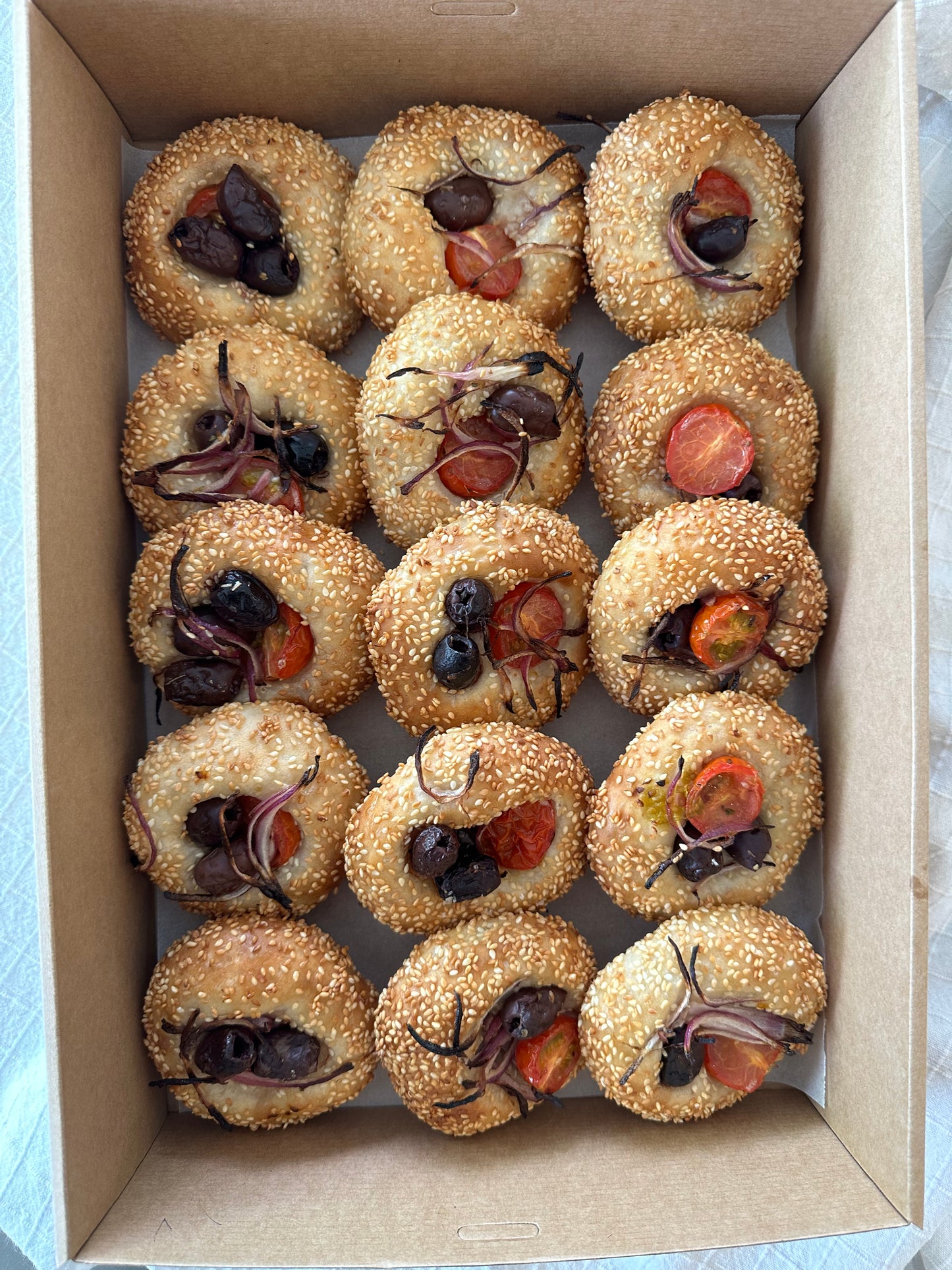 cherry tomatoes and olive vegan focaccia box